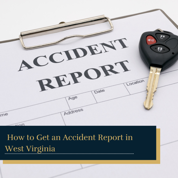 car accident report with car key on top